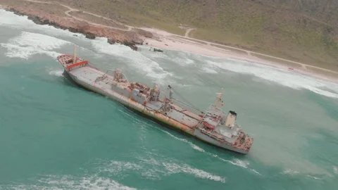 Aerial view of a cargo ship stranded off the coast of the city of Al-Jubail Stock Footage 111137071