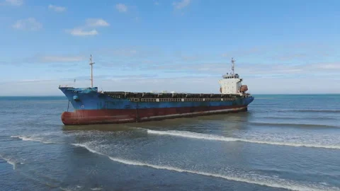 Aerial view of a cargo ship stranded off the coast of the city of Al-Jubail Stock Footage 111142635