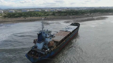 Aerial view of a cargo ship stranded off the coast of the city of Al-Jubail Stock Footage 111221268