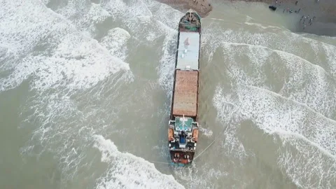 Aerial view of a cargo ship stranded off the coast of the city of Al-Jubail. Video stock 149330840