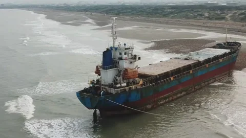 Aerial view of a cargo ship stranded off the coast of the city of Al-Jubail. Video stock 149331113