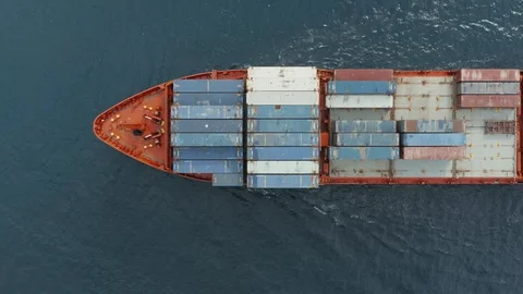 Aerial view of a cargo ship transporting containers with various goods Stock Footage 129890194