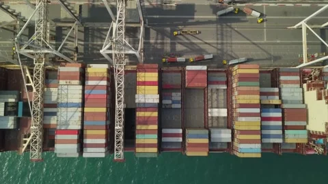 Aerial view of a cargo ship in upload, Port of Koper, Slovenia Stock Footage 165997797