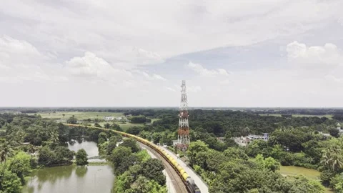 Aerial View of Cargo Train Arriving at Historic Poradah Junction in Bangladesh Stock-Footage 345041129