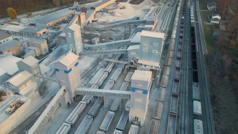 Aerial view of cargo train loaded with crushed stone materials at mining factory Stock Footage 167047002