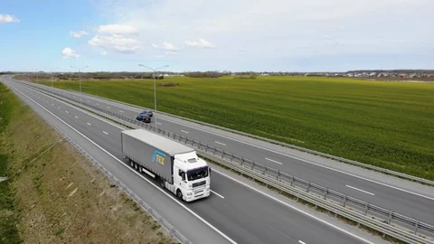 Aerial View Cargo Truck. Large Delivery Truck Moving. Aerial Shot Lorry On Ro Stock Footage 129421353