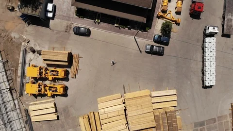 Aerial view of cargo warehouse and trucks supply Stock Footage