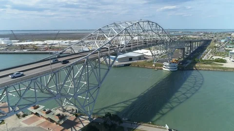 Aerial view of cars on the Corpus Christi Habor Bridge on a sunny day Stock Footage