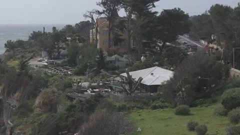 Aerial view of Casa da Guia clean up after storm Martinho Stock Footage 304690797