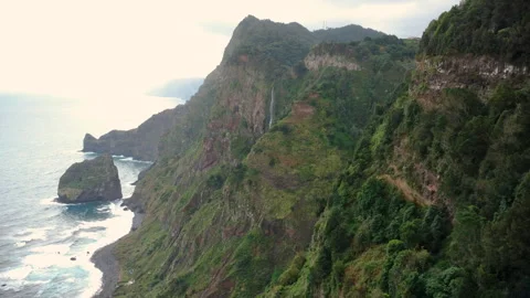 Aerial view of Cascata da Rocha do Navio waterfall and cliffs, Madeira Vídeos de archivo 328639104