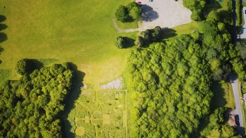 Aerial view of the castle surrounded by meadows and forests Stock Footage 140680478