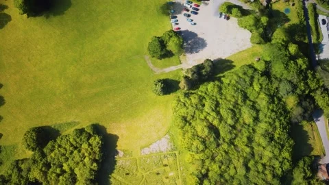 Aerial view of the castle surrounded by meadows and forests Stock Footage 141052829