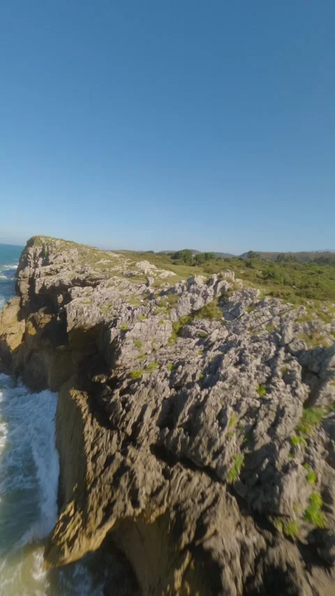 Aerial View Of Castro De Las Gaviotas And Playa De La Canalona In Asturias Spain Stock Footage 346899431