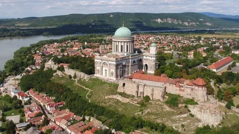 Aerial view of the Cathedral of Esztergom overooking the Danube bend - 4K drone Stock-Footage 99242570