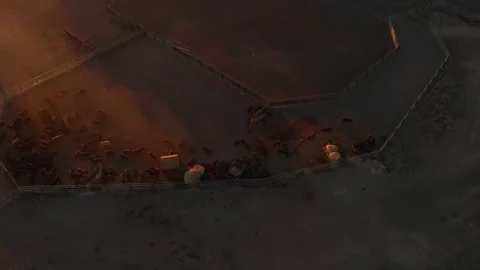 Aerial view of cattle yards at sunset in the dry outback, Emerald, Australia. Stock Footage 284820210
