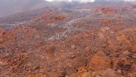 Aerial View. Caution. The camera enters the krator volcano Stock Footage 72997552