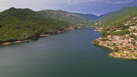 Aerial view of Cavado river and village in Peneda-Geres National Park Stock Footage 278093153