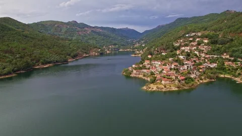 Aerial view of Cavado river and village in Peneda-Geres National Park Stock Footage 278093179