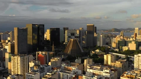 Aerial view of Centro district skyscrapers and Rio de Janeiro Cathedral, sunset Stock Footage 346134938