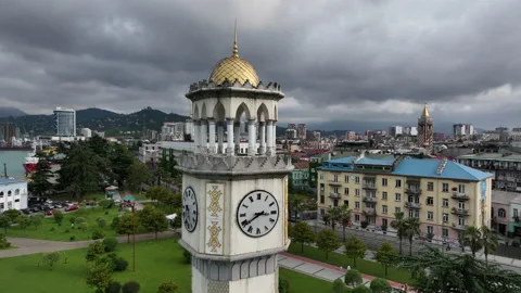 Aerial view of Chacha tower with big clock and cityscape of Batumi city Видео 199464259