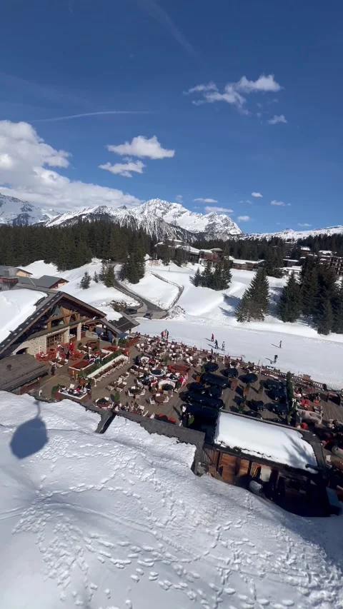 Aerial view of Chalet de Pier restaurant in Courchevel ski resort Stock Footage 342101311