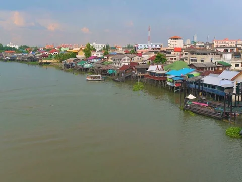 Aerial view of Chao Phraya river which have various transportation boat sail. 库存影片 75847510