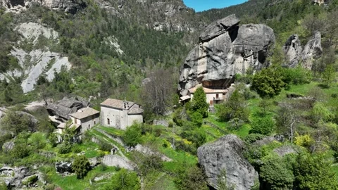 Aerial view, Chapel &amp; Boulder, Annot, Alps. Forward. Video stock 308283015