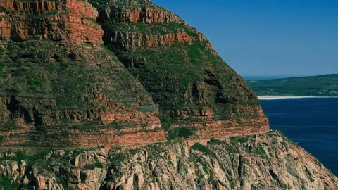 Aerial view of Chapman's Peak dramatic cliff face and ocean Stock Footage 339187011