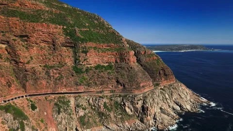 Aerial view of Chapman's Peak Drive along rugged cliff face Stock Footage 339180975