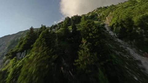 Aerial View Chasing Lush Mountain Ridge at Golden Hour, 4K Stock Footage 321200381
