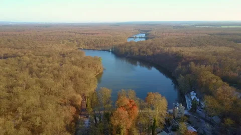 Aerial view of the Château de la reine blanche at the Étangs de Commelles Stock-Footage 137784286