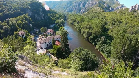 Aerial view of Cherepish Monastery in Iskar Gorge with river and mountains Stock Footage 319055949