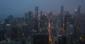 Aerial View of Chicago Skyline with Cars Traffic Jam on Busy Street Dusk Lights 4k or 4k+ Resolution