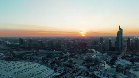 Aerial view of Chicago skyline during winter. Snow covers the roads, sidewalks Stock Footage 327891423