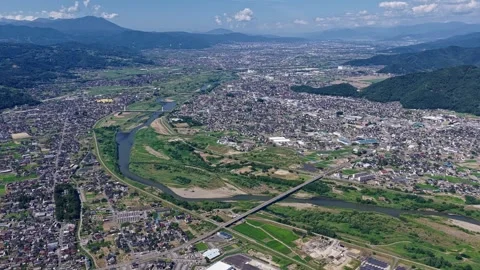 Aerial View of Chikuma River and Nagano Urban Plain Video stock 342321387
