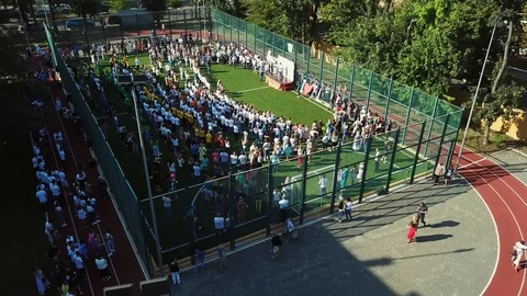 Aerial view of Children dancing in the school stadium Stock-Footage 126004488