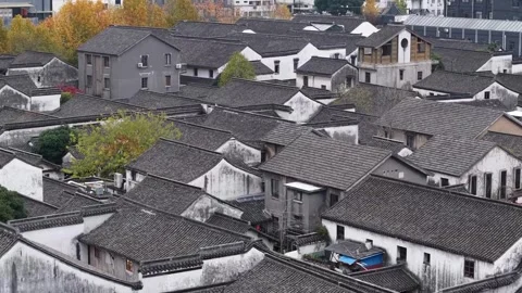 Aerial view of Chinese Jiangnan ancient water town rooftops and courtyards 스톡 동영상 336661153