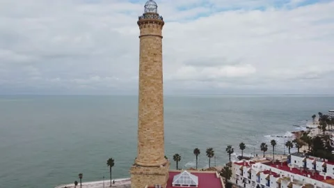 Aerial view of the Chipiona lighthouse with a drone in 4K in Spain Stock Footage 150705323