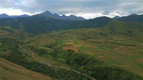 Aerial view of Chong Kemin valley in Kyrgyzstan mountains Stock Footage 345164591
