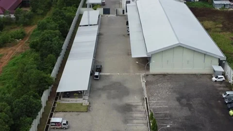 Aerial view of cigarette distribution warehouse in Banjarmasin Stock Footage 328711124