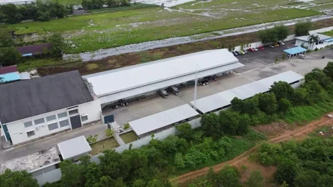 Aerial view of cigarette distribution warehouse in Banjarmasin Stock Footage 328970538