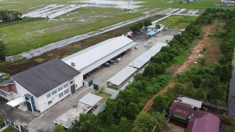 Aerial view of cigarette distribution warehouse in Banjarmasin Stock Footage 329401351