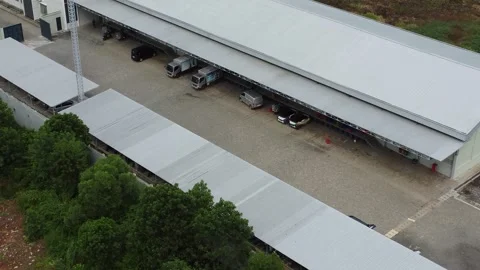 Aerial view of cigarette distribution warehouse in Banjarmasin Stock Footage 329401370