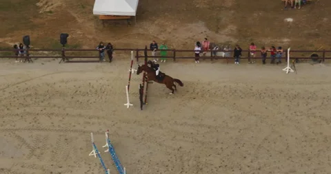 Aerial view. Cinematic slow motion close up of young female horsemanship master 스톡 동영상 249257963