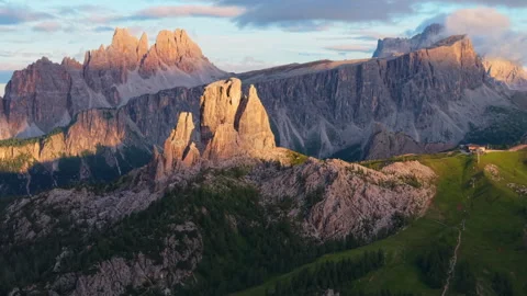Aerial view: Cinque Torri glowing at sunset in the Dolomites Stock Footage 314960140