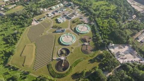 Aerial view of circular clarifiers in a wastewater treatment plant Stock Footage 344879688