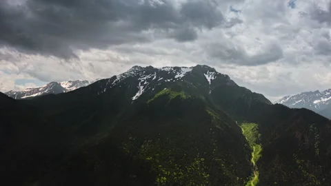 Aerial view circular flight around the mountain peak. Stock Footage 283217229