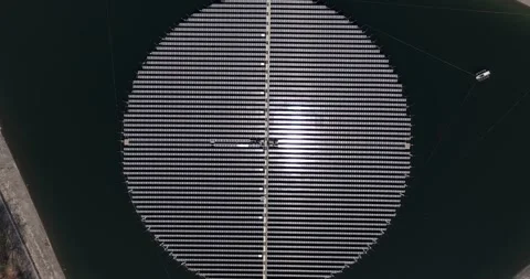 Aerial view of circular floating solar power plant generating renewable energy Stock Footage 326964738