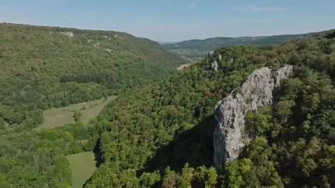 Aerial view of Cirque du Fer-a-Cheval natural amphitheater in Jura, France Stock Footage 341962341