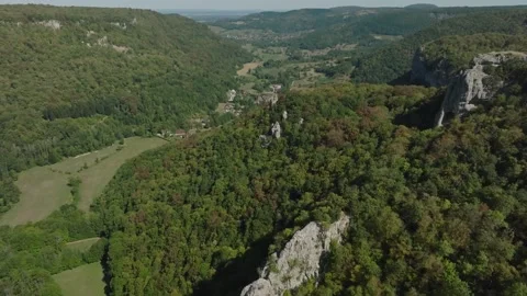 Aerial view of Cirque du Fer-a-Cheval natural amphitheater in Jura, France Stock Footage 341962357